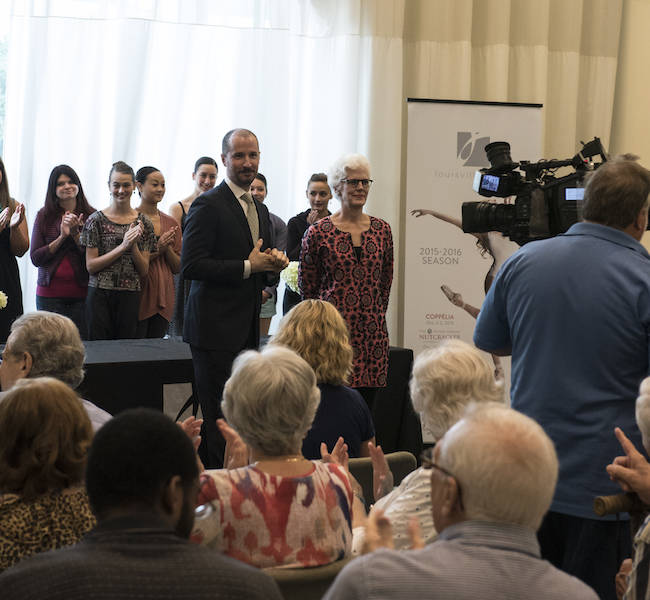 Robert Curran and Lisa Patrick Leet making the announcement of a major gift