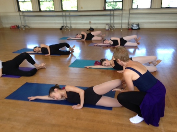 Julie Pappas-Smith teaches a floor-barre class at the Marblehead School of Ballet's Summer Intensive